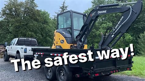 how to load a mini cat excavator on a trailer|dump trailer for mini excavator.